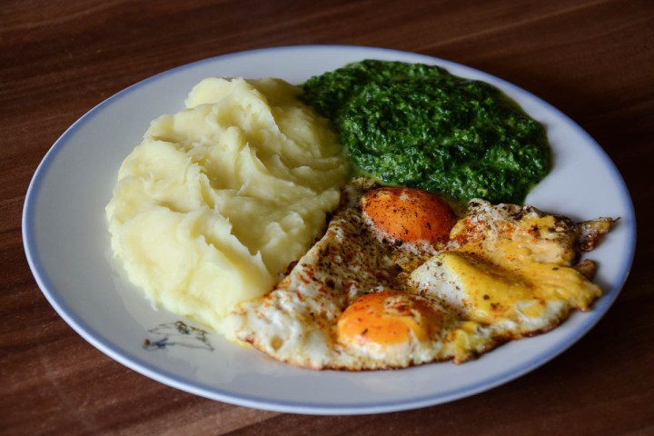 potato puree with spinach and fried eggs